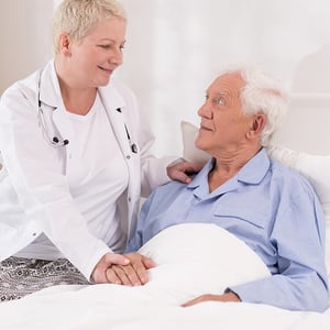 Photo of elderly patient having professional care at hospital