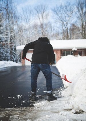 Clearing snow and ice from driveway