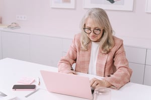 Retired woman working from home as transcriptionist