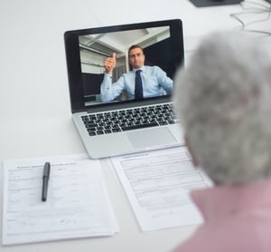 older woman speaking with young entrepreneurial professional over zoom video call