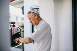 retired man checking his watch