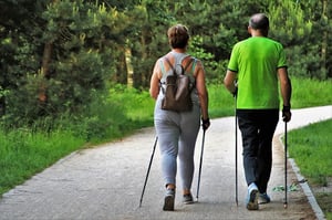 senior couple walking outdoors